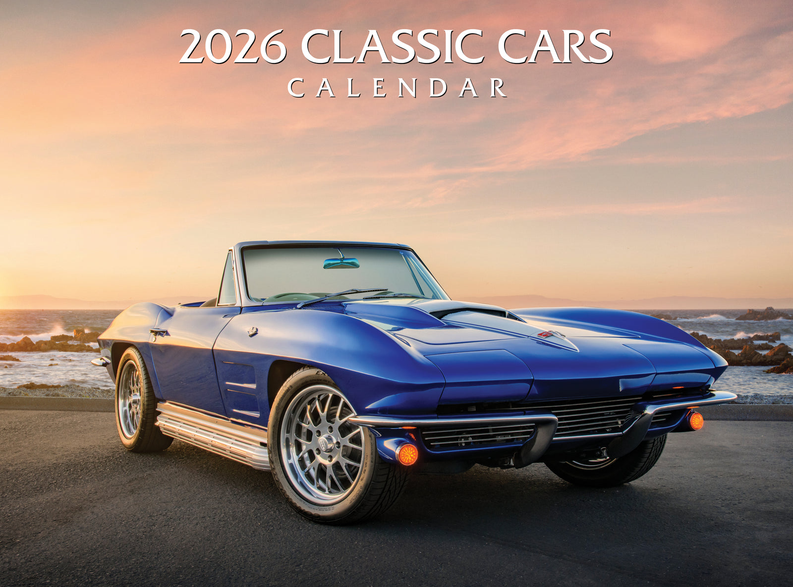 Blue classic car on a road with a sunset sky, featuring '2026 Classic Cars Calendar' text.