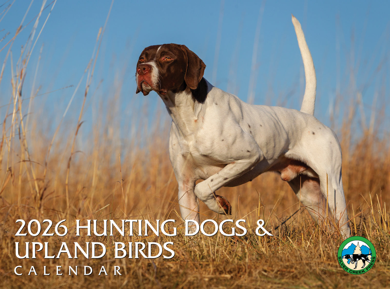 Dog standing in a field with '2026 Hunting Dogs & Upland Birds Calendar' text.